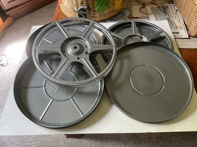 (2) JUEGOS DE CARRETES Y LATAS DE PELÍCULA Compco de 8 mm/regular8 200' gris