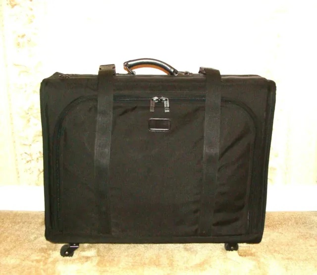 TUMI 24" Black Ballistic Nylon Leather Trim Rolling Wheeled Suitcase Luggage!