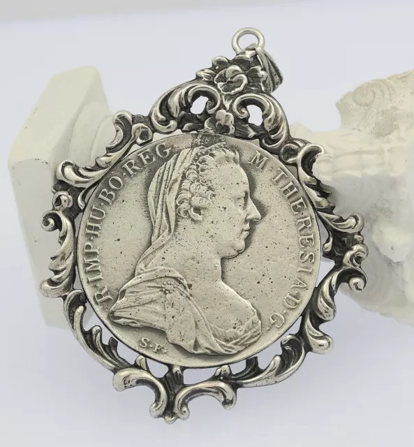 ♦♦ Anhänger Maria Theresia Taler S.F. 1780 mit Fassung in 835er Silber Charivari