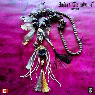 shuar tribal ethnic jewelry primitive necklace feather head tsantsa ecuador doll