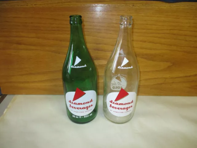 2 Vintage Diamond Beverages Hamilton Ontario Soda Bottles (Green & Clear) 30oz