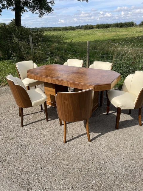 Epstein Walnut Six Seater Dining table and six cloud chairs