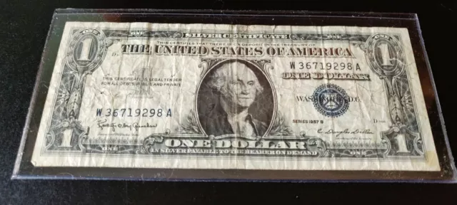 1957B series U.S. $1 one dollar silver certificate. Blue Seal. Circulated.