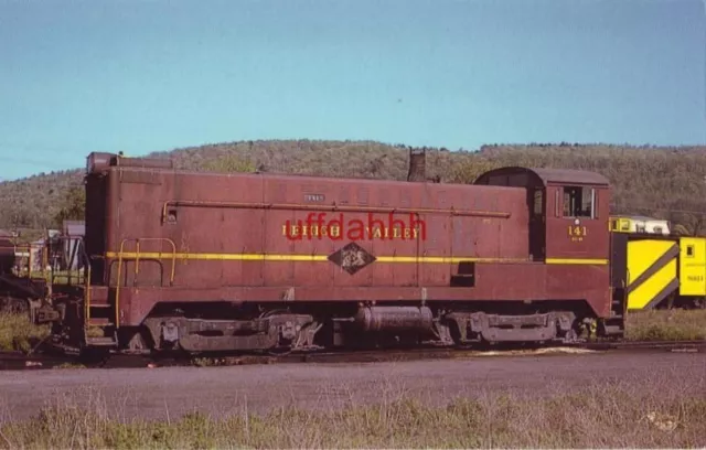 LEHIGH VALLEY RAILROAD No 141 idling in the SAYRE, PA yards MAY, 1974