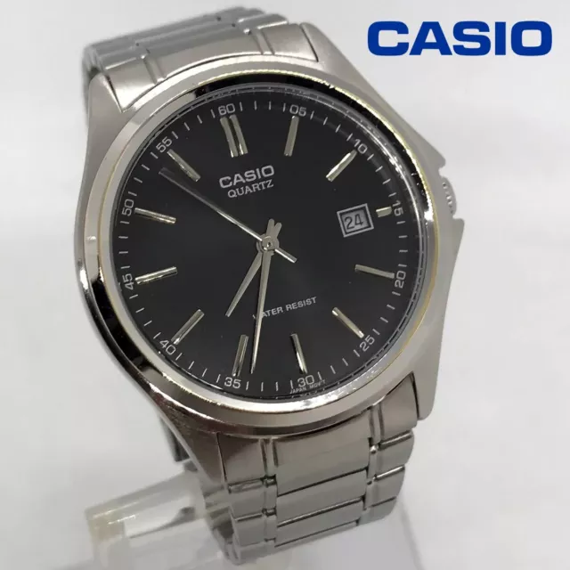 Casio MTP-1183P men's quartz analogue watch black dial bracelet + leather strap