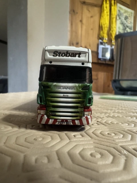 A COLLECTION OF EDDIE STOBART ITEMS TO INCLUDE A CORGI LIMITED EDITION SCANIA R CURTAINSIDE, A RADIO