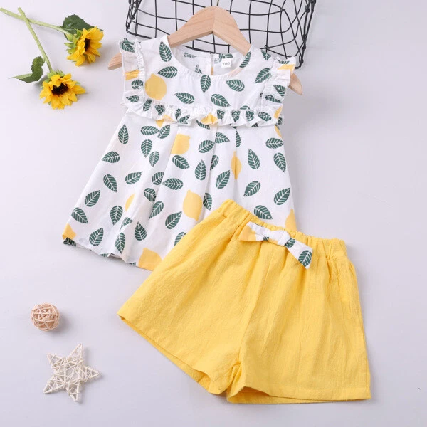 Completo Bimba bambina Maglia maniche corte pantaloni corti bianco giallo B054