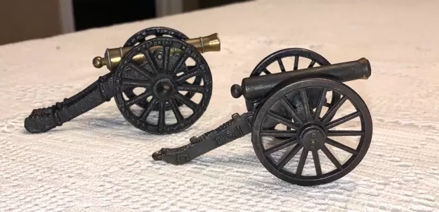 USA Vtg Lot 2 Small CAST IRON & BRASS CANNONS on WHEELS 4" and 3 3/4" Toys EUC