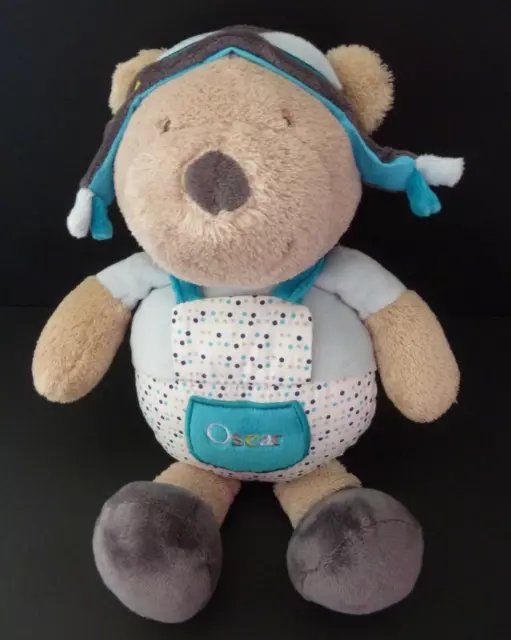 83. Doudou peluche SAUTHON OURS Oscar beige bleu blanc pois casquette 28cm TTBE