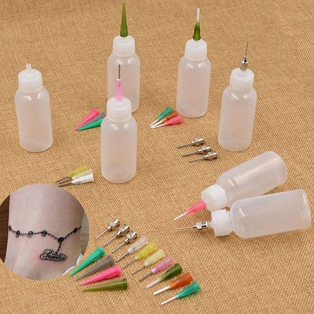 trousse au henné. l'art corporel tatouage bouteille buse outil dessin faisant