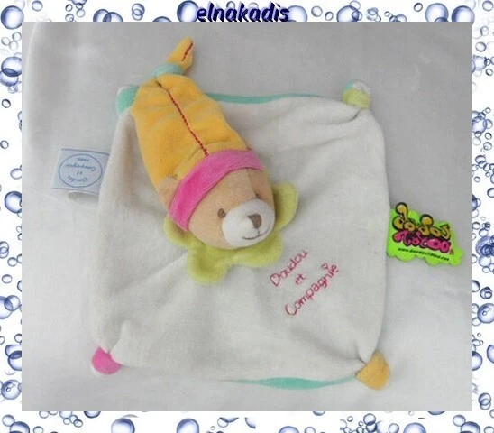 Doudou Peluche Plat Ours Blanc Tatoo Bonnet Jaune Col Vert Doudou Et Compagnie