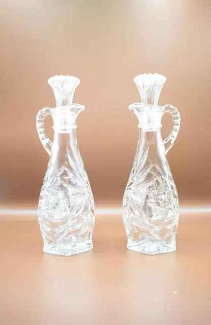 Vintage two crystal glass vinegar oil cruets with stoppers