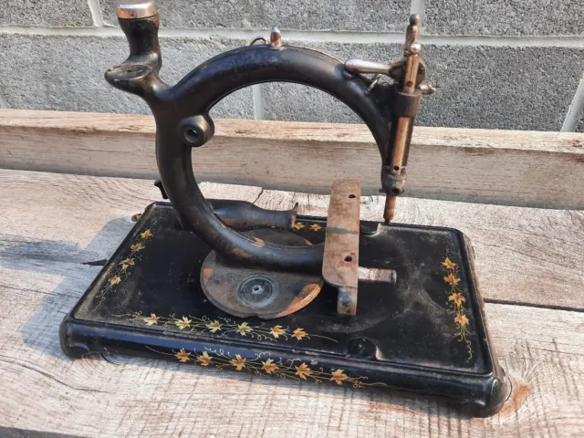 Antique Wilcox Sewing machine for parts or rebuild with cast iron base.