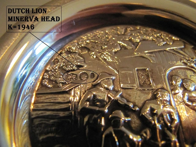 This beautiful antique solid 835 silver ashtray decorated with happy figures
