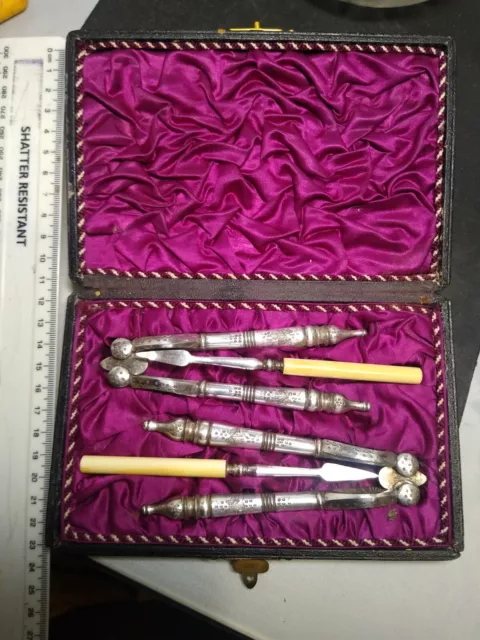 Antique Cased Set of Silver Plated Nut Crackers and prickers C1890