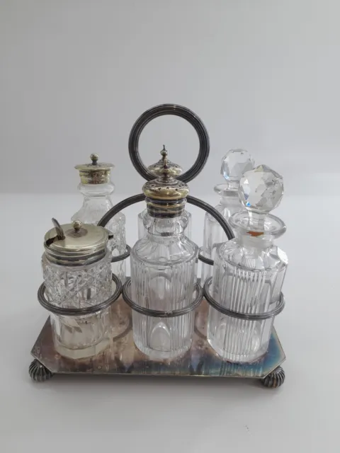 Antique Victorian cut glass and silver plate 6 Piece condiment cruet set.