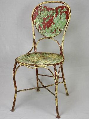 Early 20th Century French garden chair with original patina and heart back