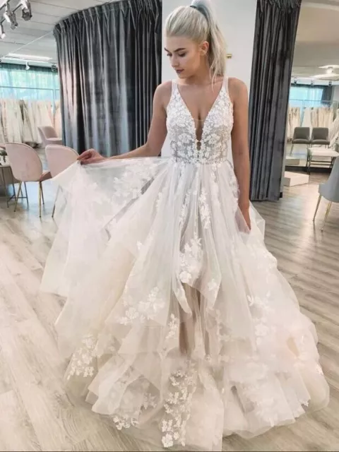 V Neck Wedding Dresses Lace Appliques Sleeveless Ruffles Sweep Train Bridal Gown