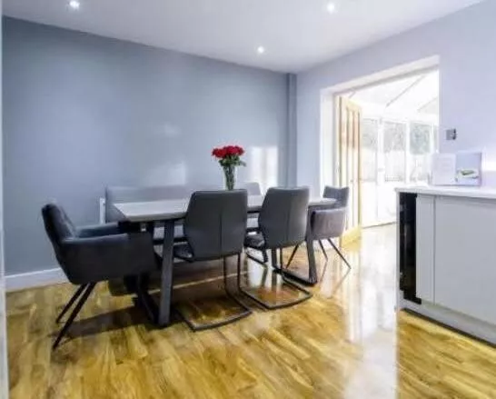 Grey Extending  Dining Table Set For 6 To 8 People With A Bench And 4 Chairs.