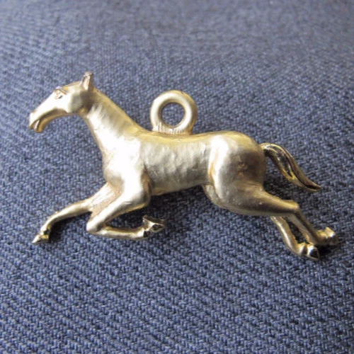 Vintage brushed golden metal running horse pin & pendant