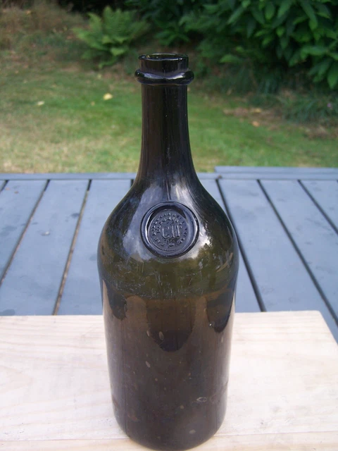 ANCIENNE BOUTEILLE DRAKKAR cognac Larsen en verrepierre de lave 70cl