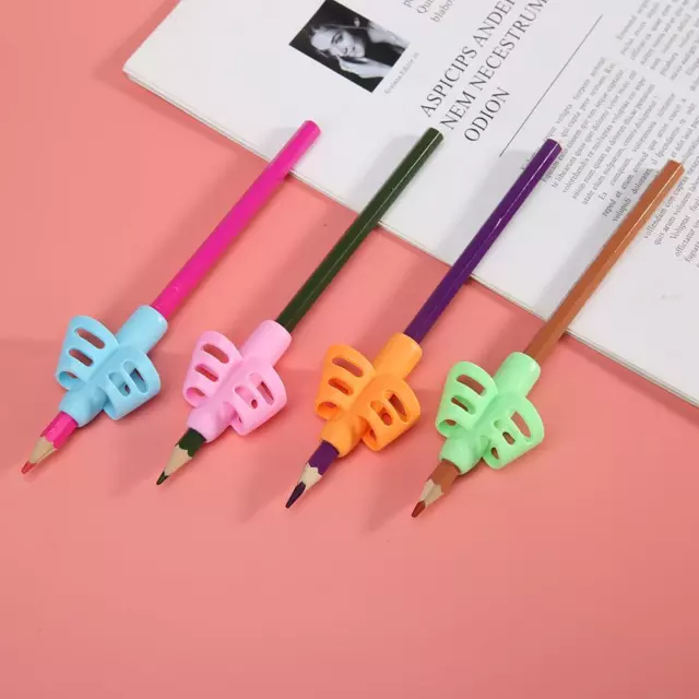 fr 4pcs Hollowed Kids Writing Pencil Holder Rubber Pen Grip Posture Correction T