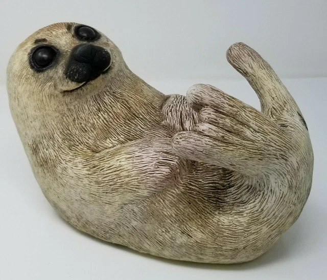 Otter Figurine Art Line Resin Floating on Back Vintage