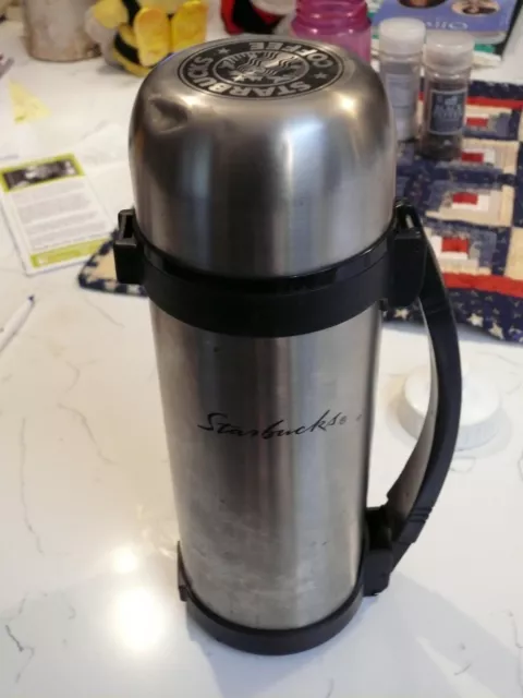 https://www.picclickimg.com/KUIAAOSwj9hcWJvy/Starbucks-stainless-steel-thermos-with-black-handle-and.webp