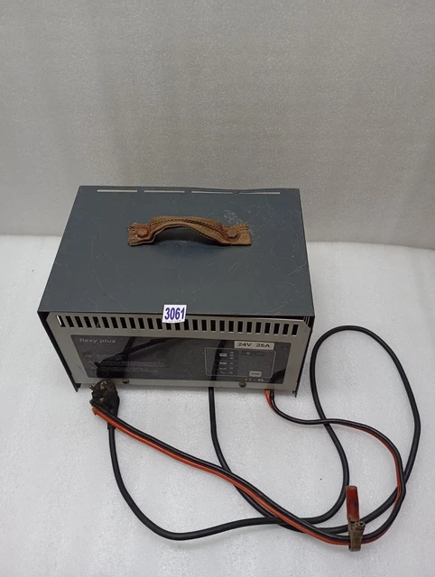 Chargeur Norman Delta V International – 110/230V, état Fonctionnel