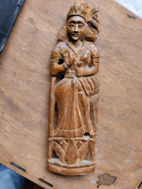 vintage wooden figure for restoration
