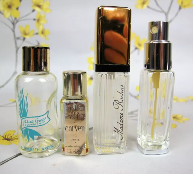 4 PERFUME SCENT BOTTLES Madame Rochas, Carven etc. Vintage.