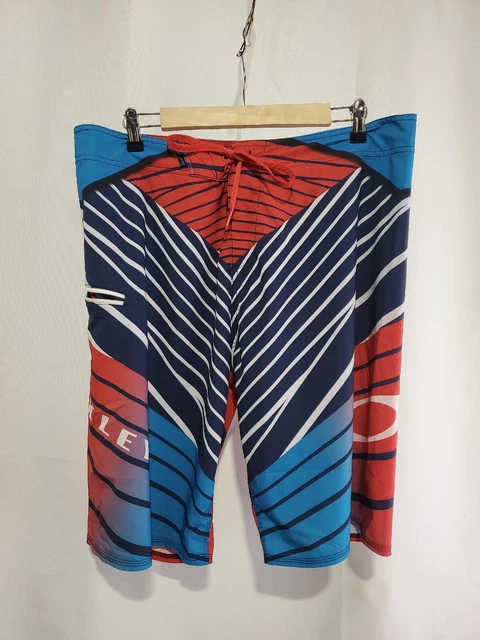 Oakley Mens Red/White Graphic Logo Surf Swim Trunks Zip Pocket Board Shorts 38 Oakley Mens Red/White Graphic Logo Surf Swim Trunks Zip Pocket Board Shorts 38
