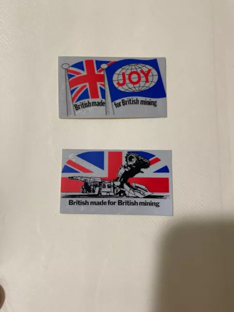 nice older lot of 2 different British Joy mining stickers