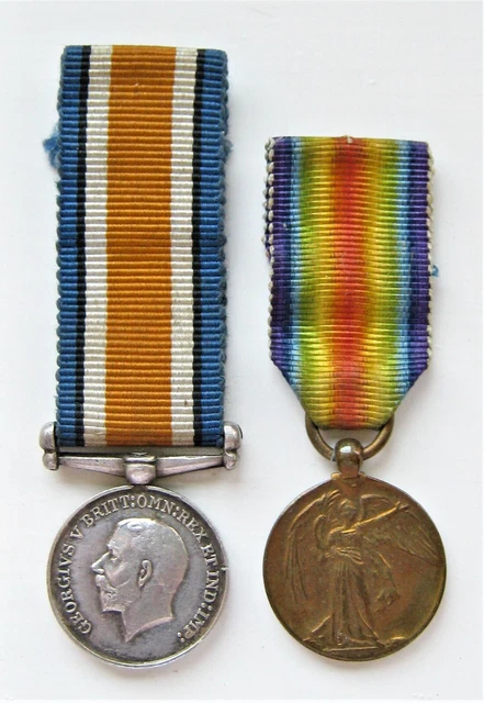A Ww1 Pair Of Miniature British War And Victory Medals
