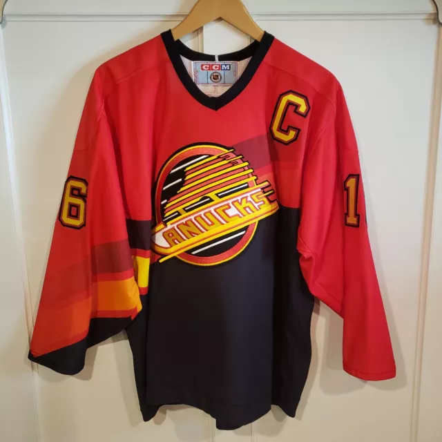 canucks salmon skate jersey