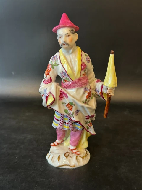 French or German Chinoiserie Figure of a Man with Umbrella. 19th Century. 6 3/8"