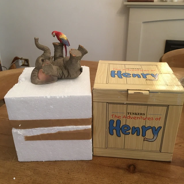 TUSKERS adventures of Henry with macaw boxed tickled pink