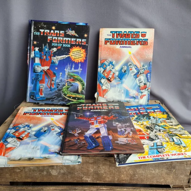 X9 Bundle of Vintage Transformers Annuals And Pop-Up Book Some Unclipped