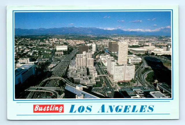 Aerial View Bustling Los Angeles Snow Mountains CA Postcard Posted 1992