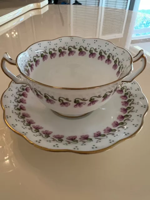 Tea Cup and Saucer Crescent George Jones & Sons Double Handled Purple Floral