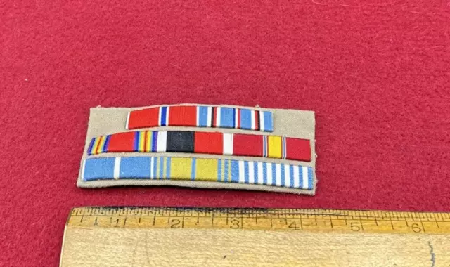 Post WW2/II US Army 8 place foreign made ribbon bar on tan for the Army