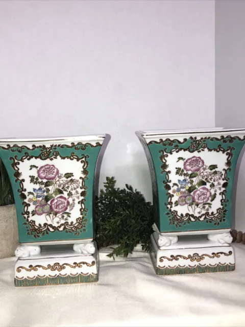 Vtg pair floral Chinese porcelain square vases with 4 foo dogs on pedestal.