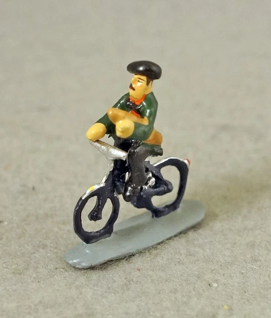 J Carlton Gault French Miniature Figurine Man & Baguette Riding Bicycle in Paris
