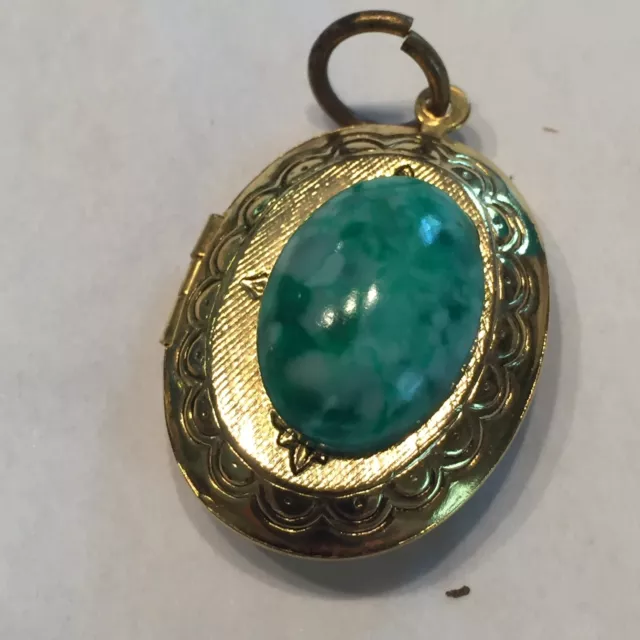Vtg GoldTone Etched Picture Locket W/green  Crystal Cabochon center