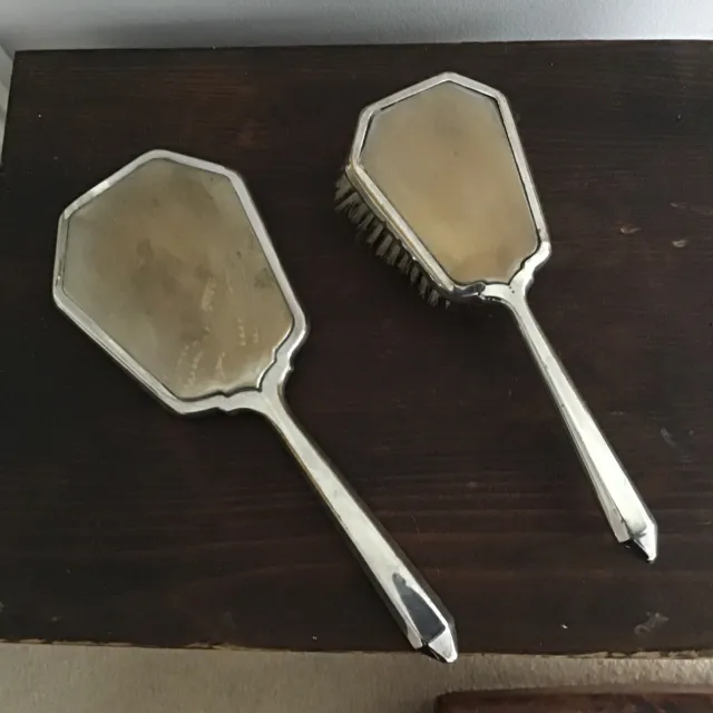 Victorian hand held mirror and hair brush Silver.