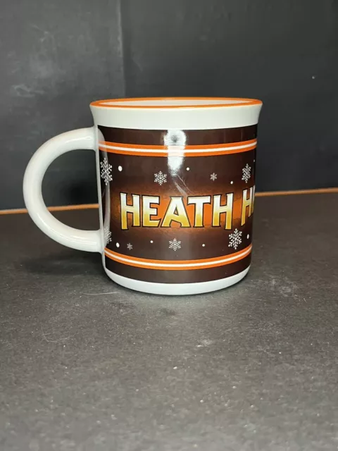 EUC GALERIE HEATH CANDY BAR 12oz COFFEE MUG CUP Snowflakes orange/brown