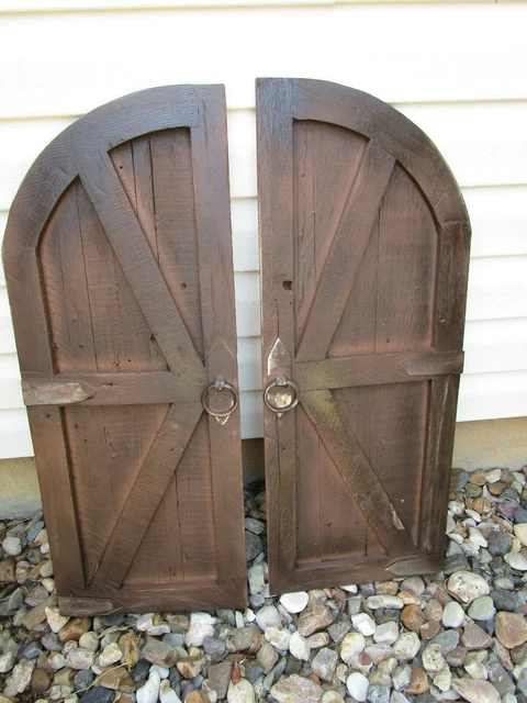 Pair of dark espresso vintage inspired round top barn doors with hardware