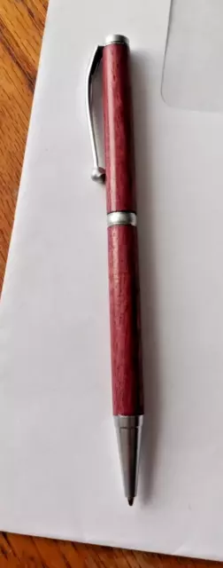 Hand Turned Twist Ballpoint Pen made with purple heart wood
