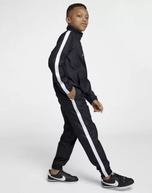 Tracksuit tissé Nike Sportswear bas seulement enfants taille S pour 8-10 ans.