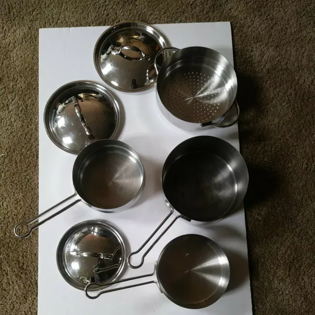 https://www.picclickimg.com/KnkAAOSwah9gyqDH/8-Piece-Revere-Ware-Proline-1801-Stainless-Steel.webp